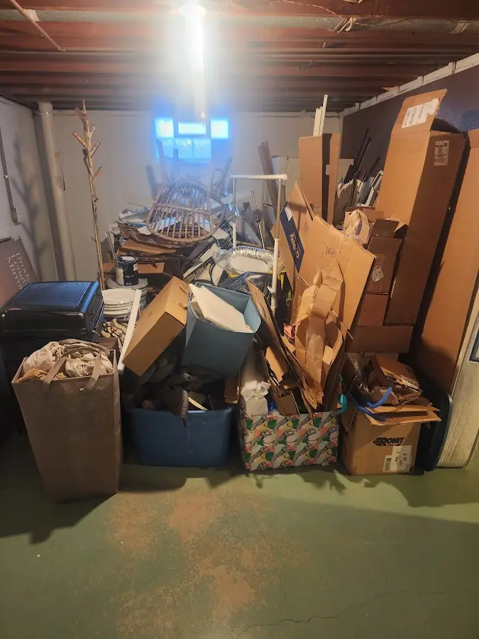 Roll-off dumpster container at job site for Roll Off Dumpster Rental in East Lake